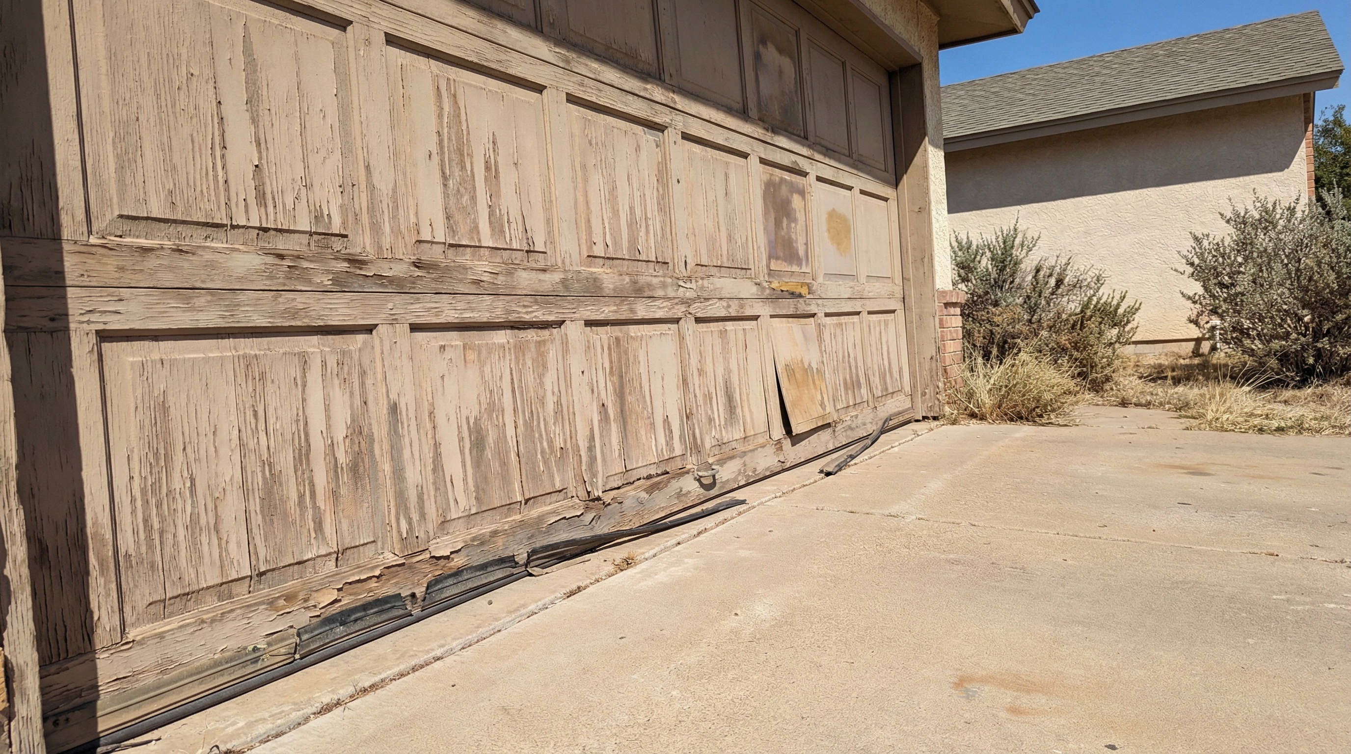 Garage door weather damage in Upper Darby Pennsylvania