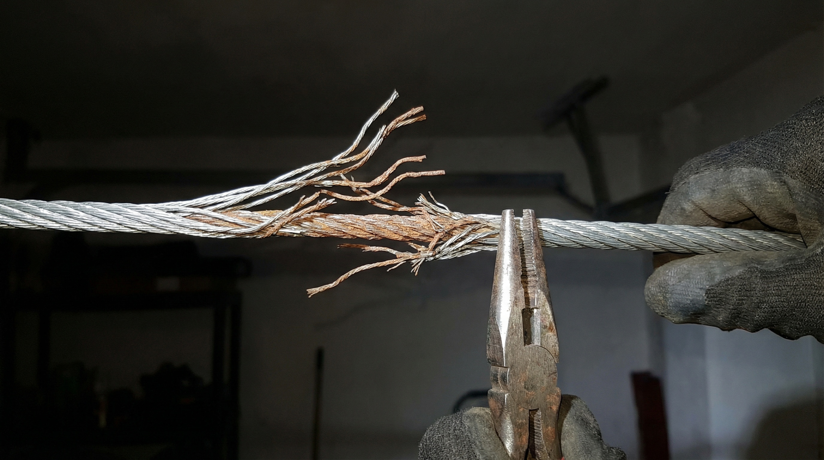 Frayed garage door cable needing repair in Upper Darby PA
