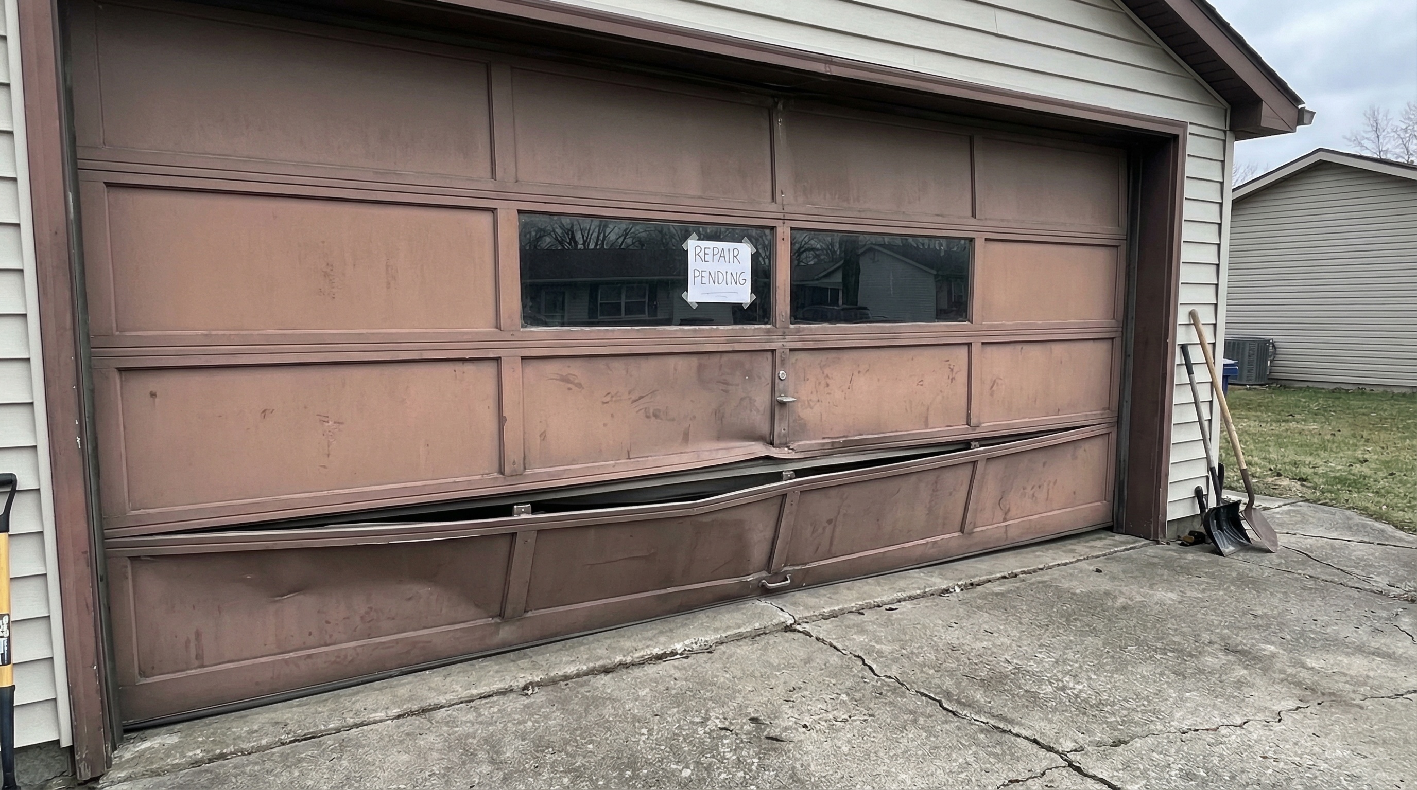 Can a damaged garage door be repaired in Upper Darby, PA? — article cover image.