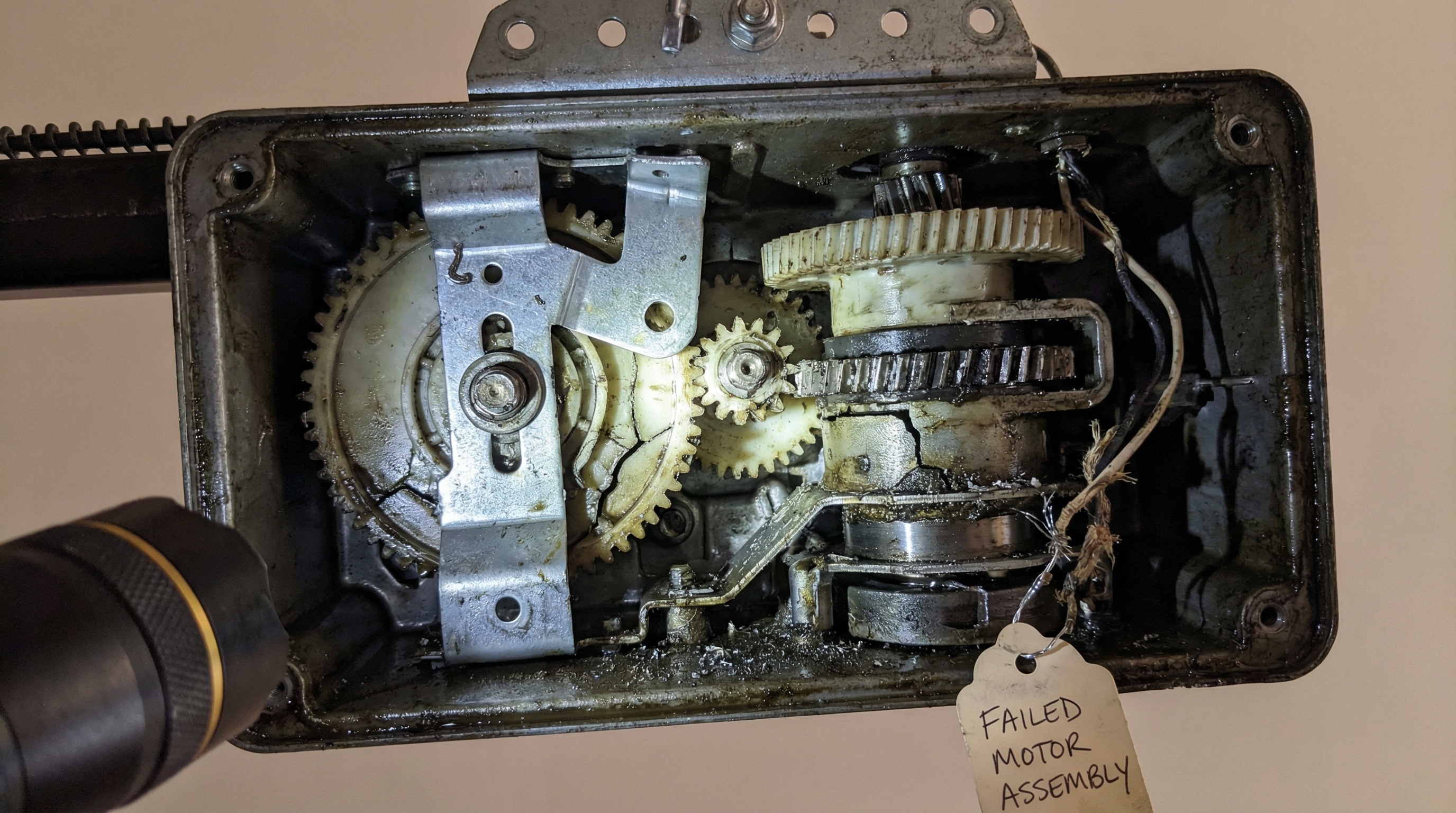 Damaged garage door motor components