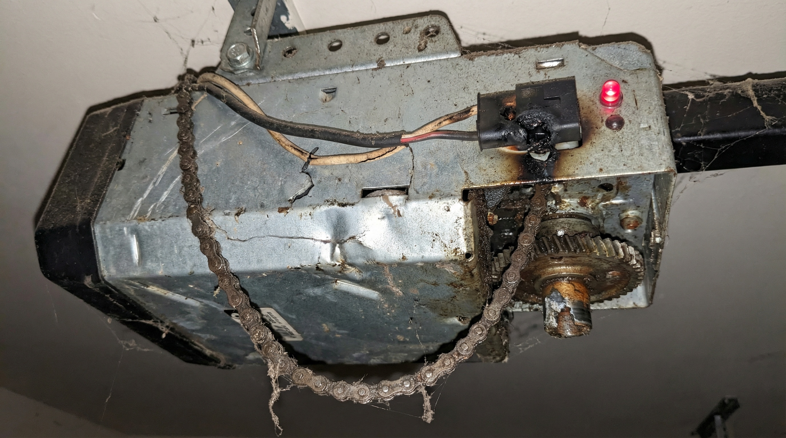 Garage door motor showing warning signs and symptoms