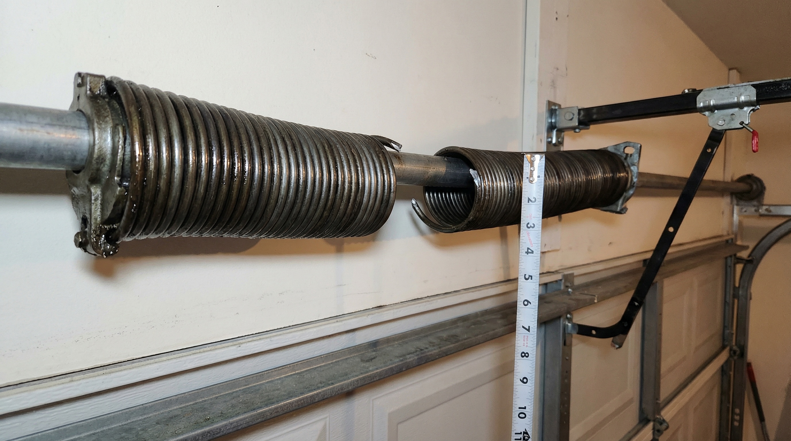 How Do I Know If My Garage Door Spring Is Broken — article cover image.