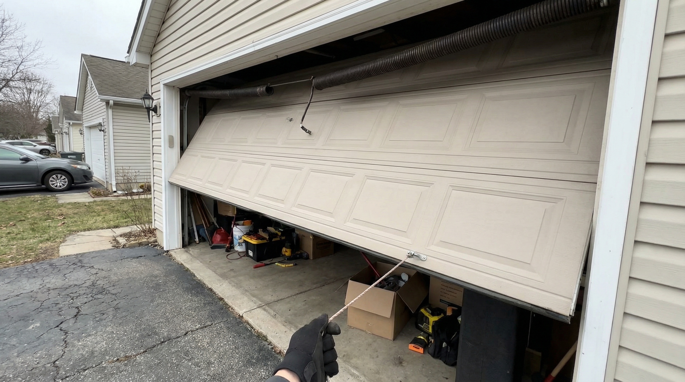 Can You Manually Open a Garage Door With a Broken Spring — article cover image.