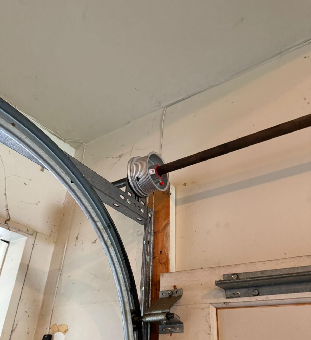 Why Your Garage Door Won't Open and How to Spot a Broken Spring Before It Gets Worse — article cover image.